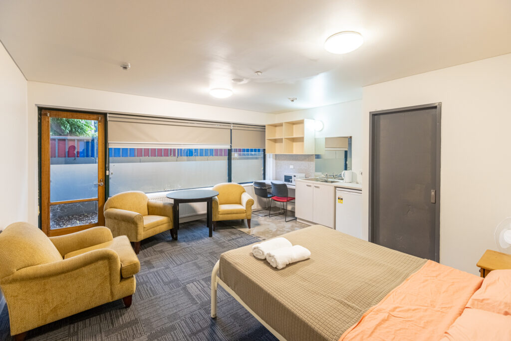 Wide angled photo of a refurbished room at Launch Housing Southbank.